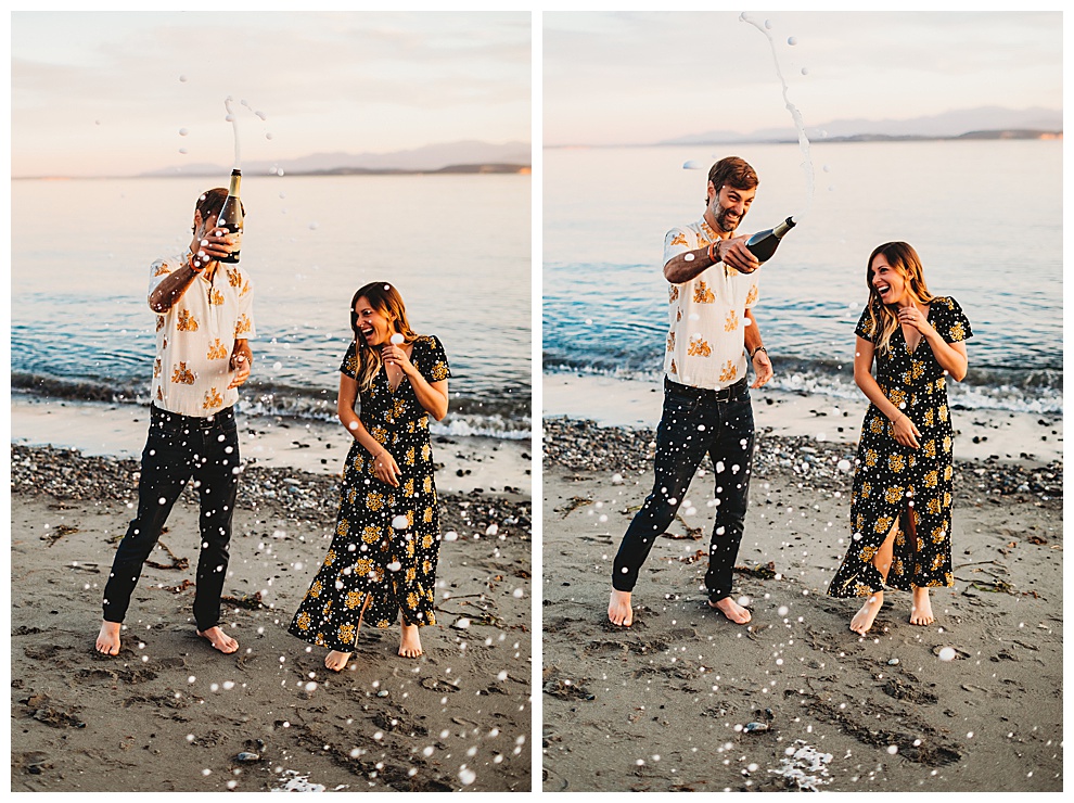 couple popping champagne during engagement shoot