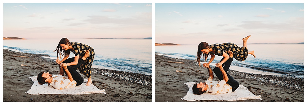 man and woman doing acro yoga on beach
