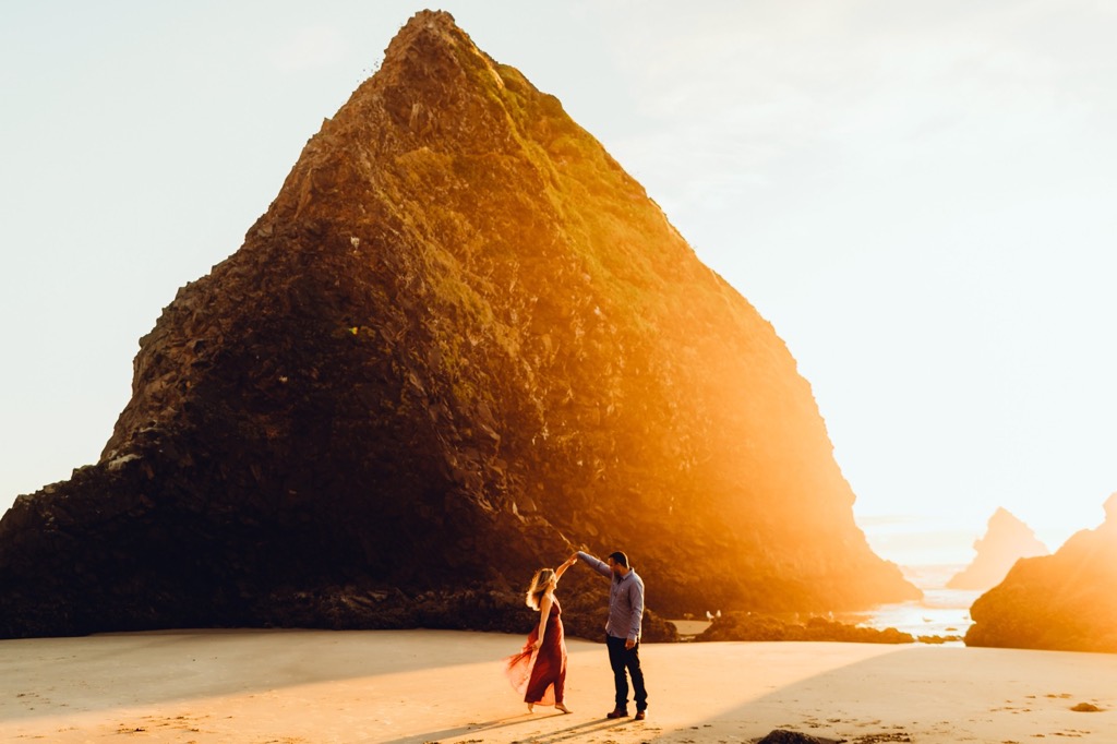 sunset engagement photos on Arch Cape beach Oregon