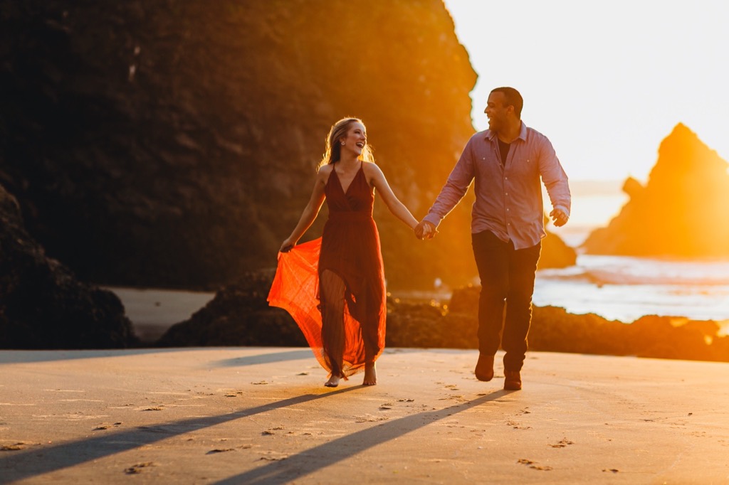 sunset engagement photos on Arch Cape beach Oregon