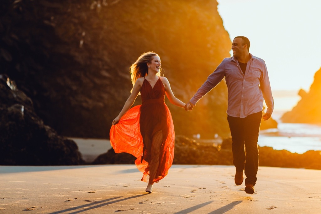 sunset engagement photos on Arch Cape beach Oregon