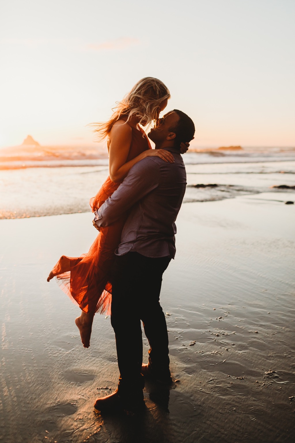 sunset engagement photos on Arch Cape beach Oregon