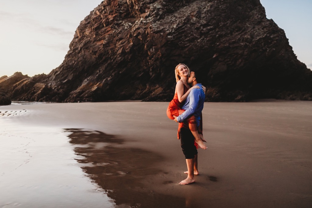 sunset engagement photos on Arch Cape beach Oregon