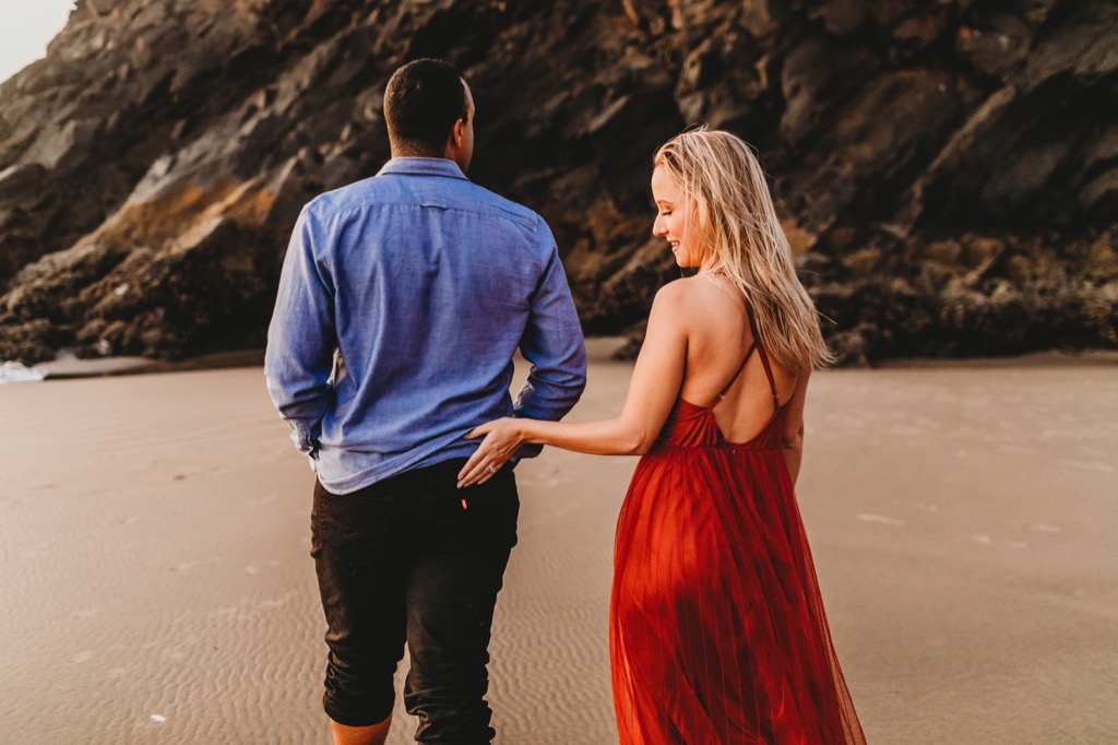 sunset engagement photos on Arch Cape beach Oregon