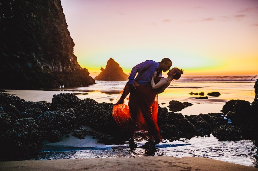 sunset engagement photos on Arch Cape beach Oregon