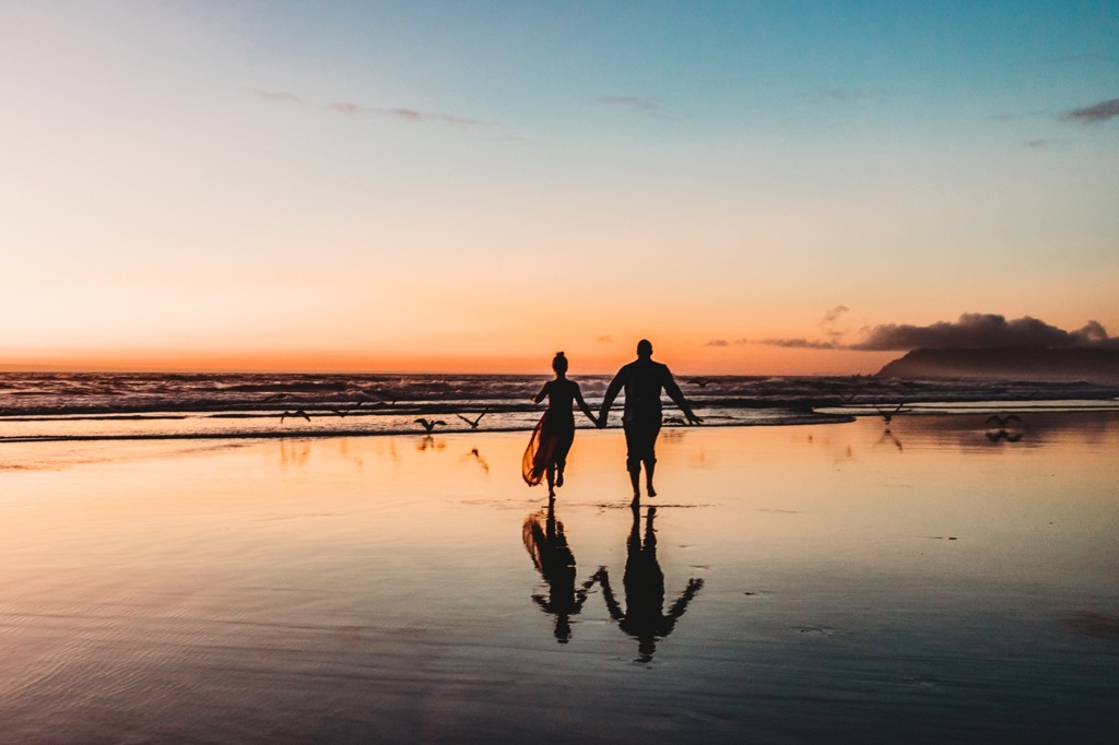 sunset engagement photos on Arch Cape beach Oregon