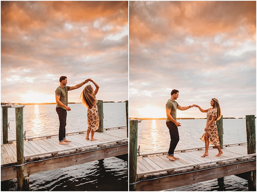 couple dances on a dock